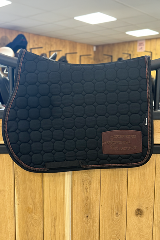 Octagon Jumping Saddle Pad E-logo